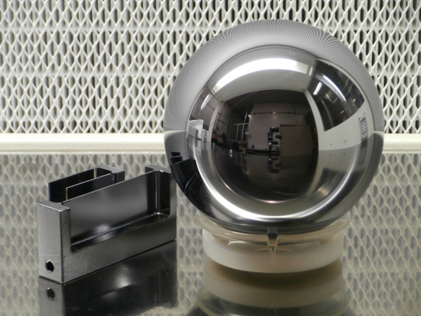The number of atoms in this silicon sphere is known given or taken 20 atoms each 10^9. The atom distance was measured by the X-ray interferometer on the left. <br/>CREDIT: Enrico Massa and Carlo Sasso A silicon kilogram