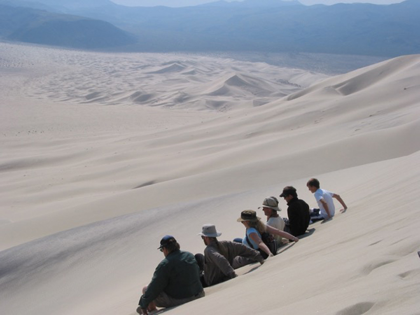 Sliding down on the seat of your pants and creating a large sand avalanche on the 200m-high Eureka Dune in Death Valley National Park, Calif. <br/>CREDIT: Vriend Sliding down on the seat of your pants and creating a large sand avalanche on the 200m-high Eureka Dune in Death Valley National Park, Calif.
