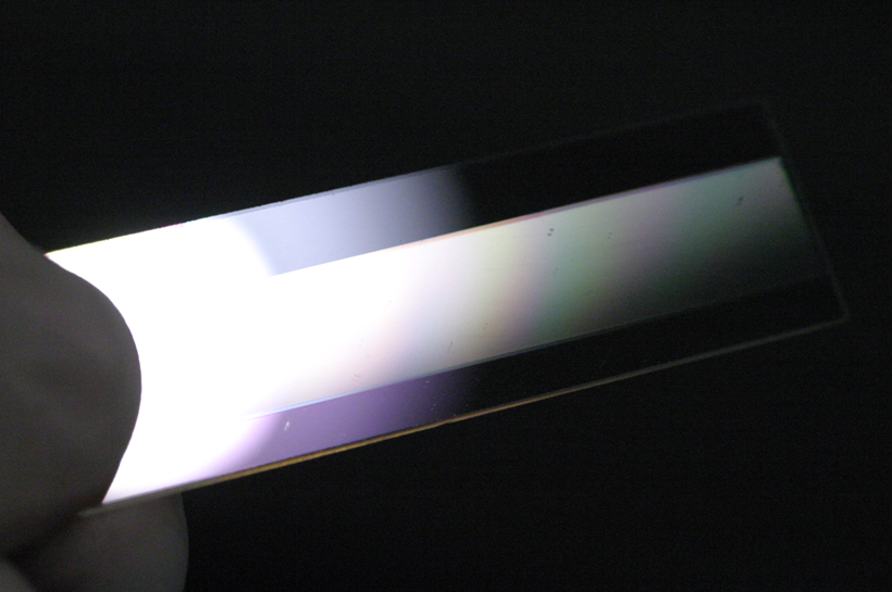 A waveguide device for a holographic video monitor under construction at BYU. <br/>CREDIT: D.Smalley/BYU A waveguide device for a holographic video monitor under construction
