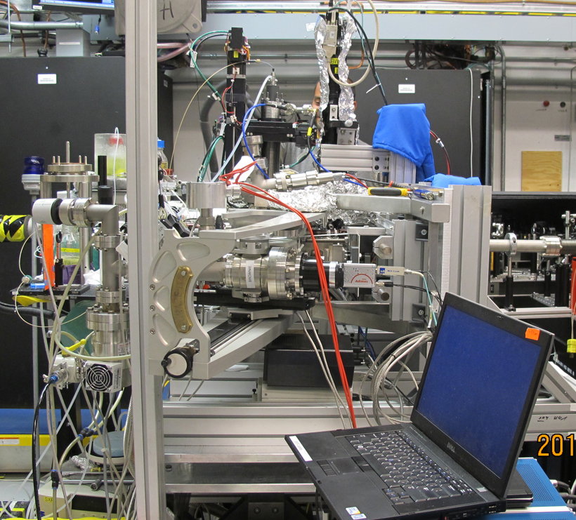 In this picture the resonant inelastic soft x-ray scattering (RIXS) spectrometer in the foreground and the liquid jet sample delivery system in the background. <br/>CREDIT: S. Schreck, HZB/UP Resonant ineleastic soft x-ray scattering (RIXS)